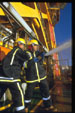 Firemen on a boat �Total/John Borowski