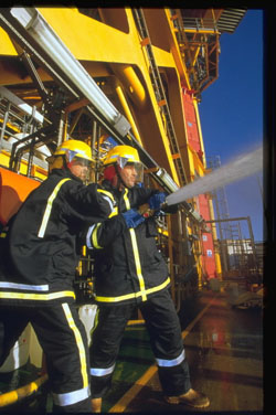 Firemen on a boat �Total/John Borowski